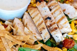 Southwest Salad with Grilled chicken, mixed greens, black bean & corn salsa, cheddar jack & tortilla chips.  Served w/jalapeno ranch
