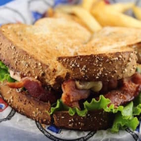 Boss BLT Sandwich with Bacon, lettuce, tomato and our homemade roasted tomato aioli Boss Sauce. Served on toasted wheat bread