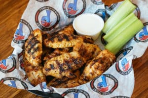 Memphis style chicken wing appetizer served with ranch and celery sticks. Gluten free!
