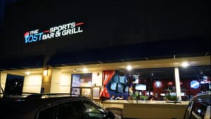 The Post Sports Bar & Grill sign lit up in Creve Coeur
