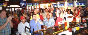 Fans drinking beers and cheering on the St.Louis Cardinals at The Post Sports Bar & Grill Creve Coeur