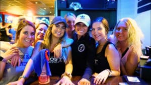 Staff members at The Post Sports Bar & Grill in Fenton smiling