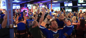 Crowd cheering the St.Louis blues Stanley Cup Finals at The Post Sports Bar & Grill in Maplewood