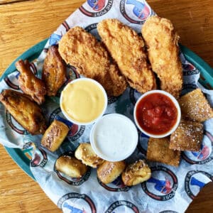 hot wings, chicken fingers, soft pretel bites, and toasted ravioli with ranch marinara and beer cheese
